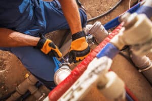 Plumber from repipe solutions working on repiping a 2000 sq foot home in Houston