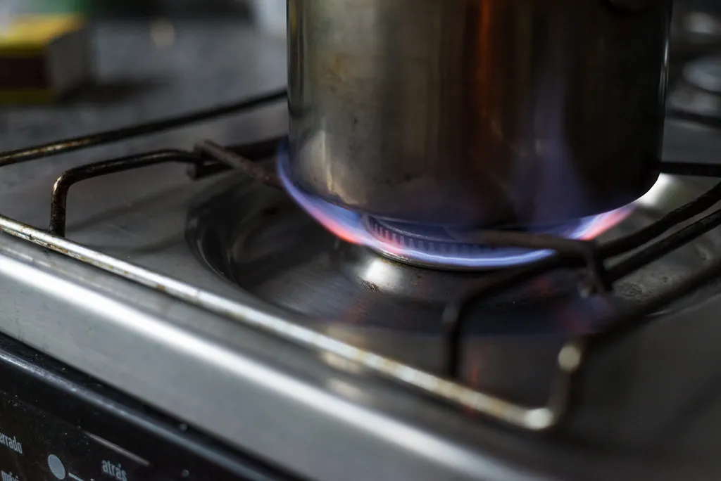 Blue flame on a gas stove burner
