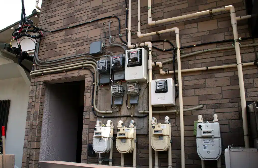 Residential gas meters on the outside wall of a building