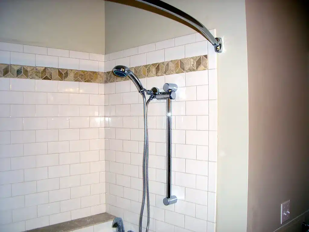 Tiled walk-in shower with a handheld showerhead