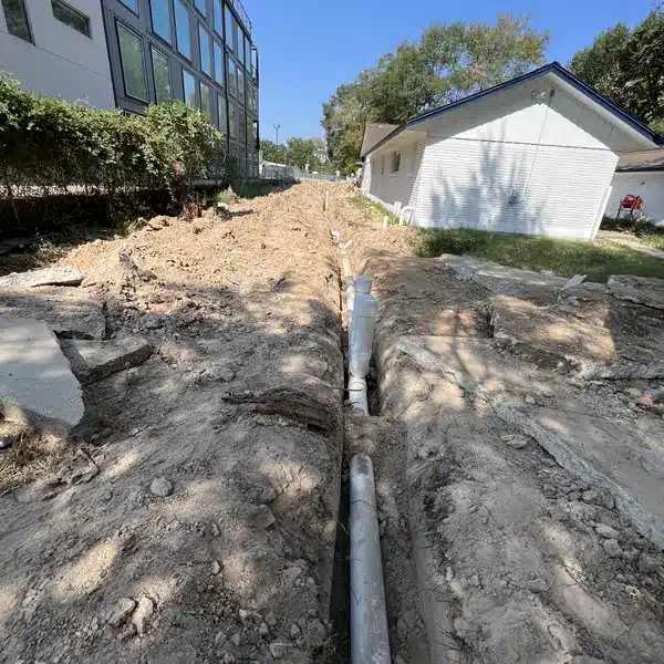 New PVC sewer line in an open trench